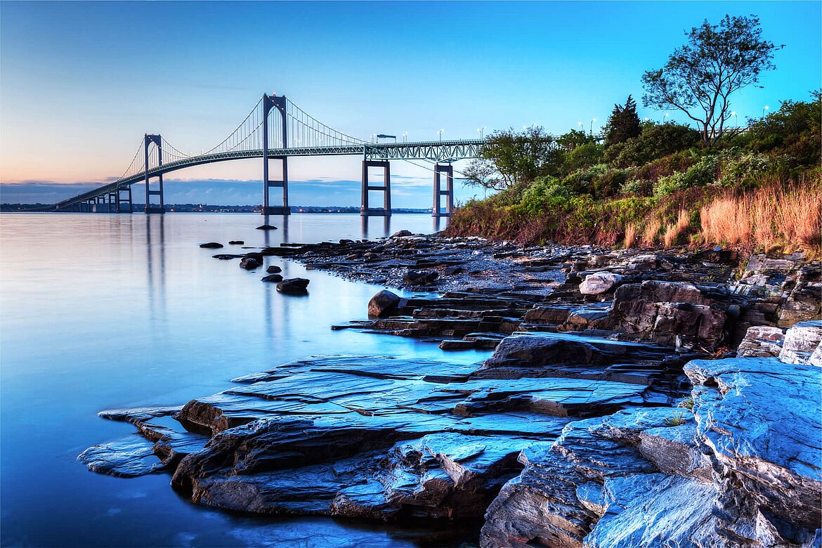 Nice landscape with a bridge that leads above a river.